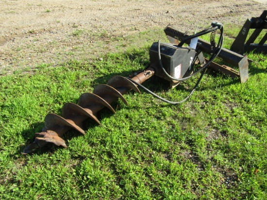 1715. McMILLAN SKID LOADER MOUNTED HYDRAULIC POST AUGER WITH 12 INCH AUGER