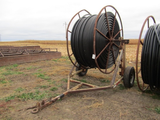 712. APPROX.   3800 FT.T. OF 1.5” PLASTIC WATER LINE ON CABLE CADDY TWO WHE