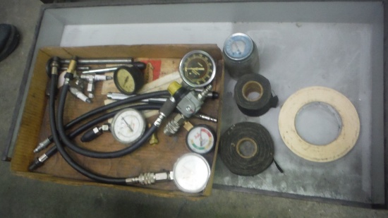 Lot of assorted cylinder compression gauges, spark plug testers, gaffers tape