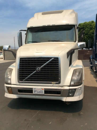 2015 Volvo VNL64T Tractor Truck, heavy duty, conventional cab, 6x4, 10 speed manual transmission, 12