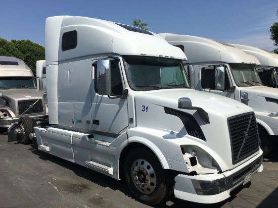 2015 Volvo VNL64T Tractor Truck, heavy duty, conventional cab, 6x4, 10 speed manual transmission, 12