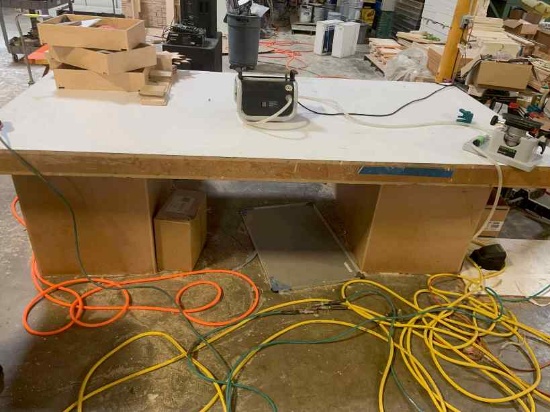 Work table with vacuum pump