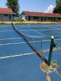 Tennis court net and fencing