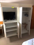 White cabinet with tv