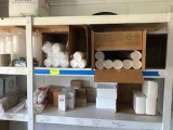 Shelving with Kitchen Supplies (Straws, lids, napkins)