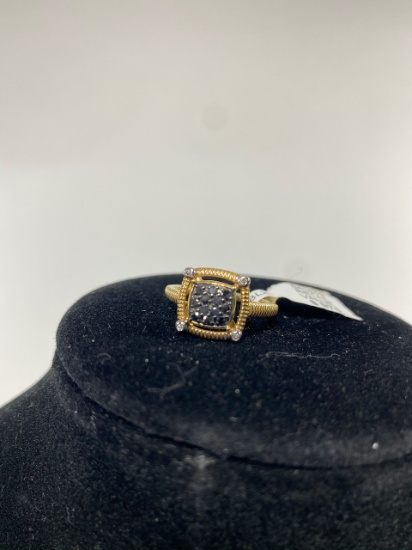 Black and White Diamond ring, 14k gold, .25 total weight . Size estimated to be a 7-8, retail $975.0