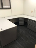 Office cubicle, bulletin board and file cabinet