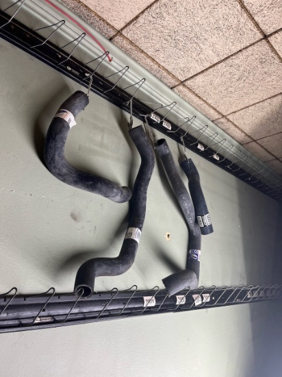 Automotive Belts ..Includes Belt Racks. If wanted, buyer removes Belt Racks.