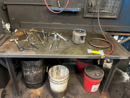 Bench with tools, boxes, misc.' on the wallÉ....Does not include conveyor.