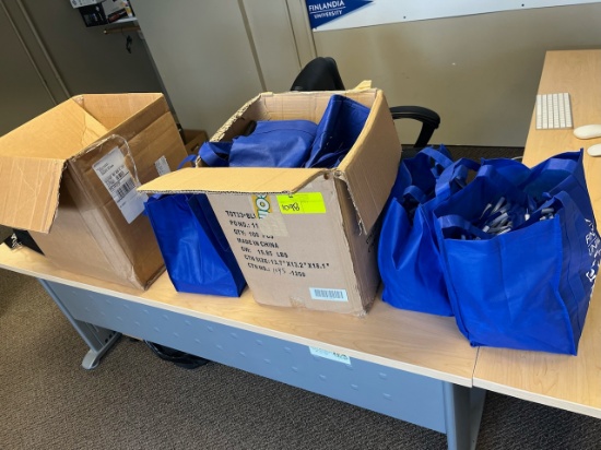 Loc: 12.6.  Lot of Finlandia University Memorabilia Swag to Include Pens, Bags, Sunglasses, and Fris