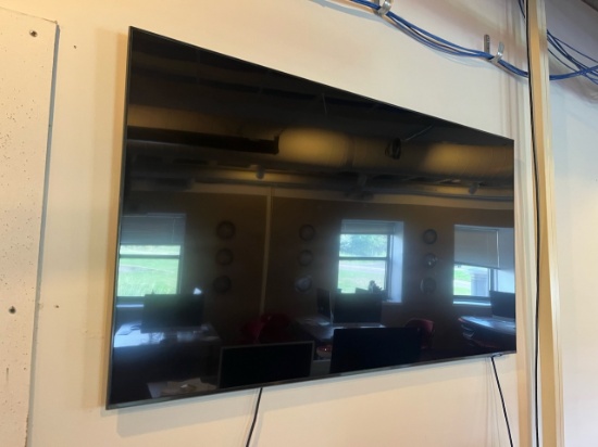 Loc: 12.2. Samsung 65" Flat screen TV with wall mount. This lot is located at: 200 Michigan St, Hanc