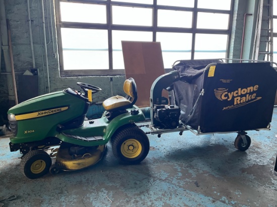 Loc: 11.  John Deere X304 42" riding lawn mower with Cyclone Rake Jet Patch Vacuum System 549 hours