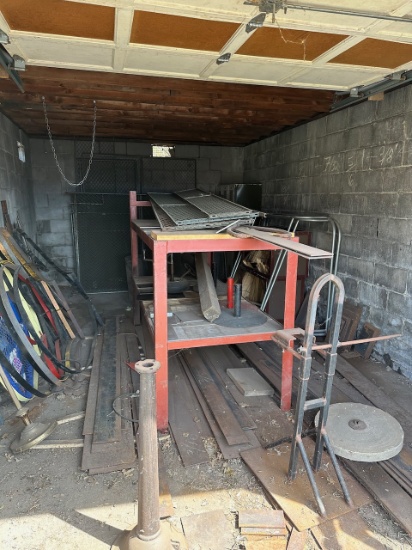 Loc: Bus.  Lot of assorted metal for scrap, to include but not limited to; flat metal, security gate
