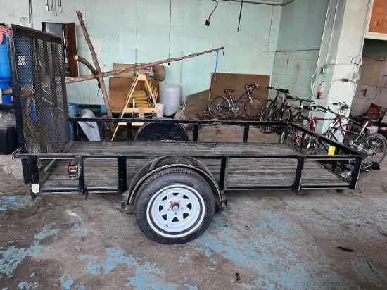 Loc: 11.  Rice Utility Trailer 5'x10' with ramp gate, single axle, 2 1/4 in ball. Sold with a bill o