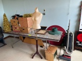 Loc: 12.5. Table with Contents to Include DŽcor, Bust Mannequin, Vacuum