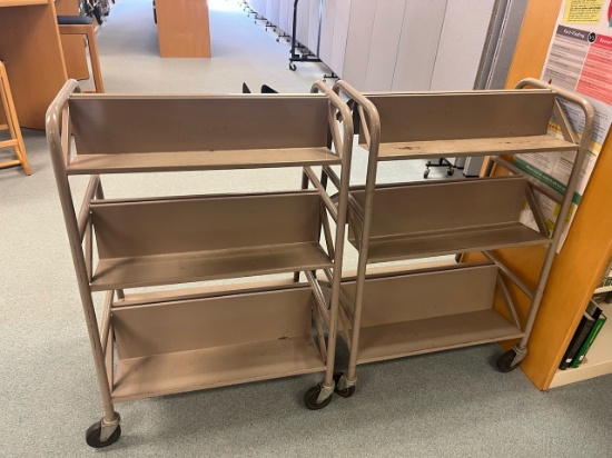 Loc: 5. Lot of 2 Double sided book carts 28"x14"x40". This lot is located at: 598 Finn St, Hancock,