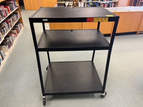 Loc: 5. 3 Tier Media cart 32"x28"x44" (no plug). This lot is located at: 598 Finn St, Hancock, MI 49