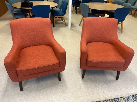 Loc: 6. Lot of (2) Fabric Orange Chair. This lot is located at: 532 Franklin St, Hancock, MI 49930.