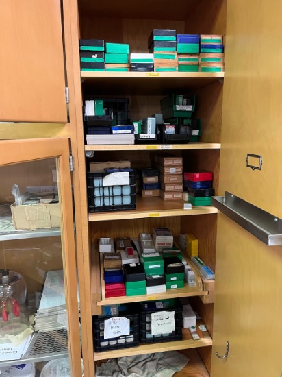 Loc: 3 Lab. Contents of cabinets to include 5 shelf levels of micro slides. This lot is located at:
