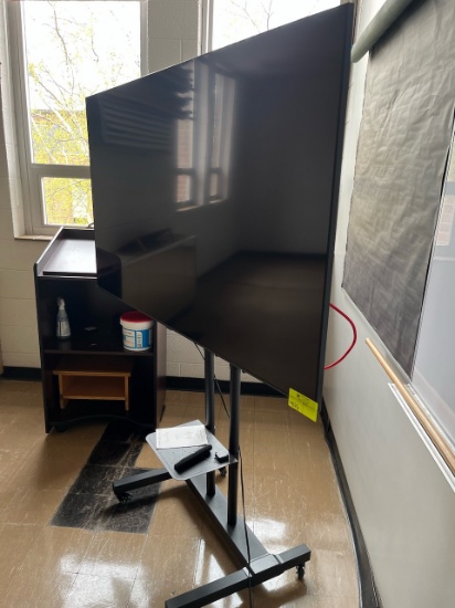 Loc: 3. Samsung 70" flat screen TV on rolling cart. This lot is located at: 601 Franklin St, Hancock