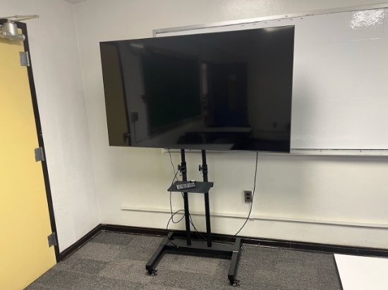 Loc: 4, N29. Samsung 70" flat screen TV on rolling cart. This lot is located at: 601 Franklin St, Ha