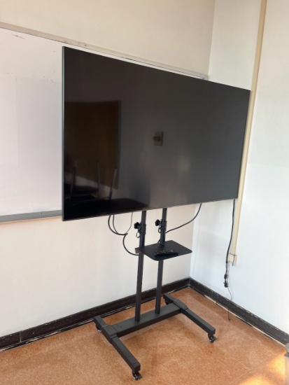 Loc: 4, N22. Samsung 70" flat screen TV on rolling cart. This lot is located at: 601 Franklin St, Ha