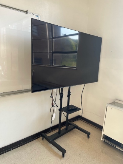 Loc: 4, N23. Samsung 70" flat screen TV on rolling cart. This lot is located at: 601 Franklin St, Ha