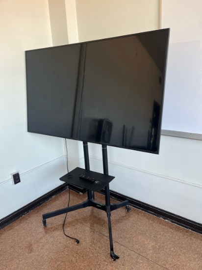 Loc: 4, N27. Samsung 65" Flat Screen TV on rolling cart. This lot is located at: 601 Franklin St, Ha