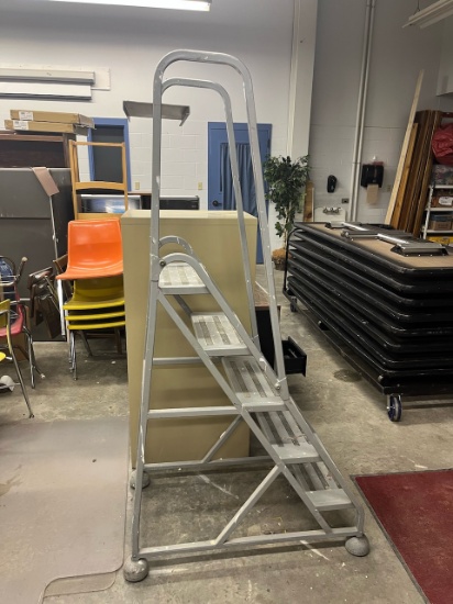 Loc: 4.14B. 5-Step Rolling Safety Ladder. This lot is located at: 601 Franklin St, Hancock, MI 49930
