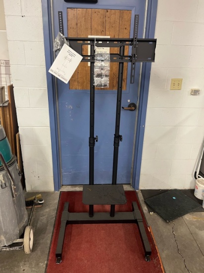 Loc: 4.14B. Rolling TV Stand Model: MT1001. This lot is located at: 601 Franklin St, Hancock, MI 499