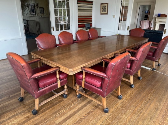 Loc: 8. Conference Table 48"x144"x29" w/ (10) Leather Chairs on wheels. This lot is located at: 612