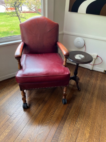 Loc: 8. Red leather chair with side table. This lot is located at: 612 Quincy St, Hancock, MI 49930.