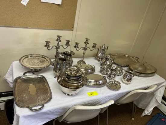 Loc: 8. Lot of Silver Plated dinnerware (24) pieces . This lot is located at: 612 Quincy St, Hancock