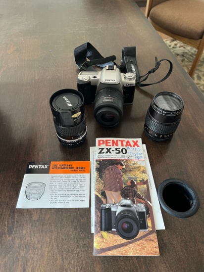 Loc: 8. Pentax Camera model:ZX-50 with (2) lenses. This lot is located at: 612 Quincy St, Hancock, M
