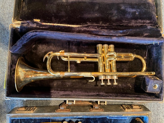 Loc: 11, Stage. 1X Vintage Trumpet - Conn brand, 1 X H.L. Clay brand - both with carrying cases. Thi