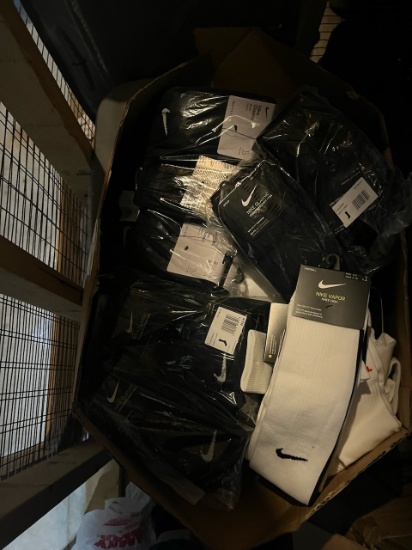 Loc: 2, 105. Box of new Nike soccer socks, blue and white . This lot is located at: 535 Summit St Ha