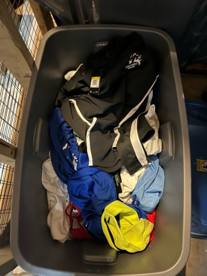 Loc: 2, 105. Assorted new & used athletic apparel, shorts, socks, shirts, jackets. This lot is locat
