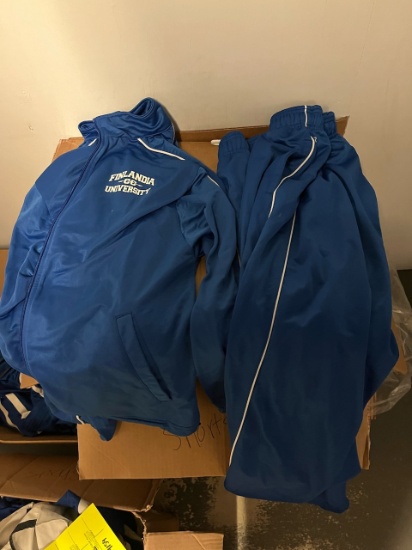 Loc: 2, 105. 4 Blue track pants & 2 track Jackets. This lot is located at: 535 Summit St Hancock, MI
