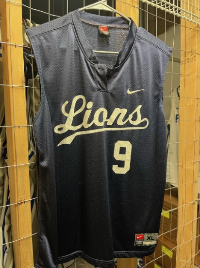 Loc: 2, 105. 2 Navy Blue Nike Softball Jerseys numbers 9, 18 & 2 Under Armour long sleeve under shir