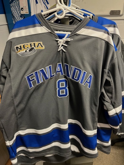 Loc: 2, Court. 7 JOG Athletics gray, white and blue Finlandia University Hockey jerseys numbers 8, 2