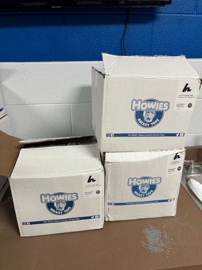 Loc: 2, Court. 3 Boxes of Cloth Hockey tape, 1 black, 1 white, 1 clear. This lot is located at: 535