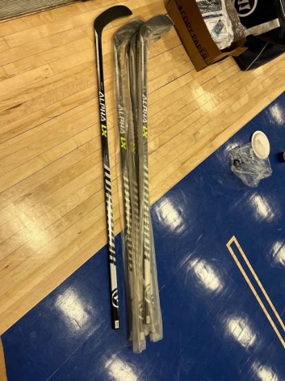 Loc: 2, Court. New Warrior Alpha LXT Covert QR5T W03-75-FLEX-SR Hockey Stick. This lot is located at