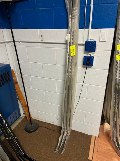 Loc: 2, Court. New Warrior Alpha LXT W03-65-FLEX-SR Hockey Stick. This lot is located at: 535 Summit
