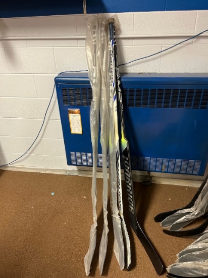 Loc: 2, Court. Lot of assorted new and used Hockey Goalie Sticks - (3) 26", (1) 26.5", (1) 23.5". Th