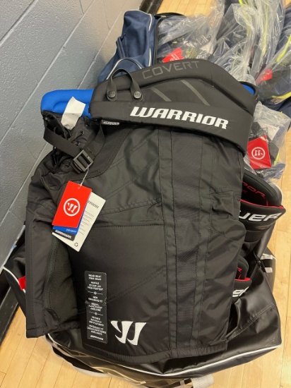 Loc: 2, Court. 5 pairs of New Bauer and Bauer brand hockey pant pads with bag. This lot is located a