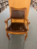 Loc: 5. Vintage Wooden and Leather chair. This lot is located at: 598 Finn St, Hancock, MI 49930