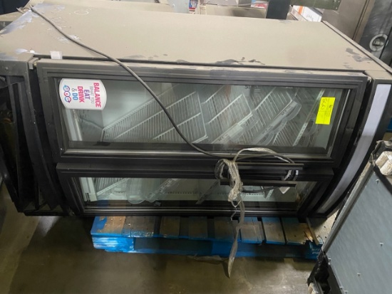 Rec -  57" Beverage Cooler (brand: TRUE). Assumed model is similar or same to GDM-14RF: Note: Bottom