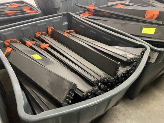 LargeTote of Used Conveyor Sliders Approx 46.5" Long X 4.5" Wide - Approx QTY 60