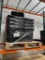 8 balck tote bins on a pallet,