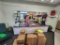 Misc. coportate office waiting area furniture with chairs, frames, filing armoire